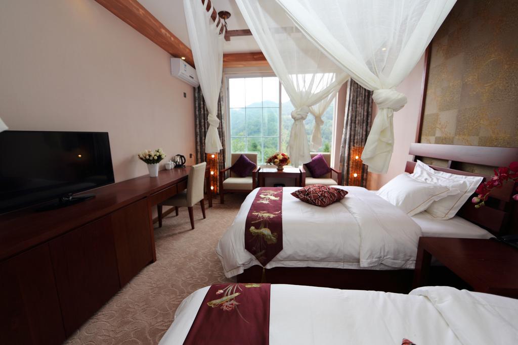 Panshan Tingquan Tuwo Holiday Resort Leshan Room photo