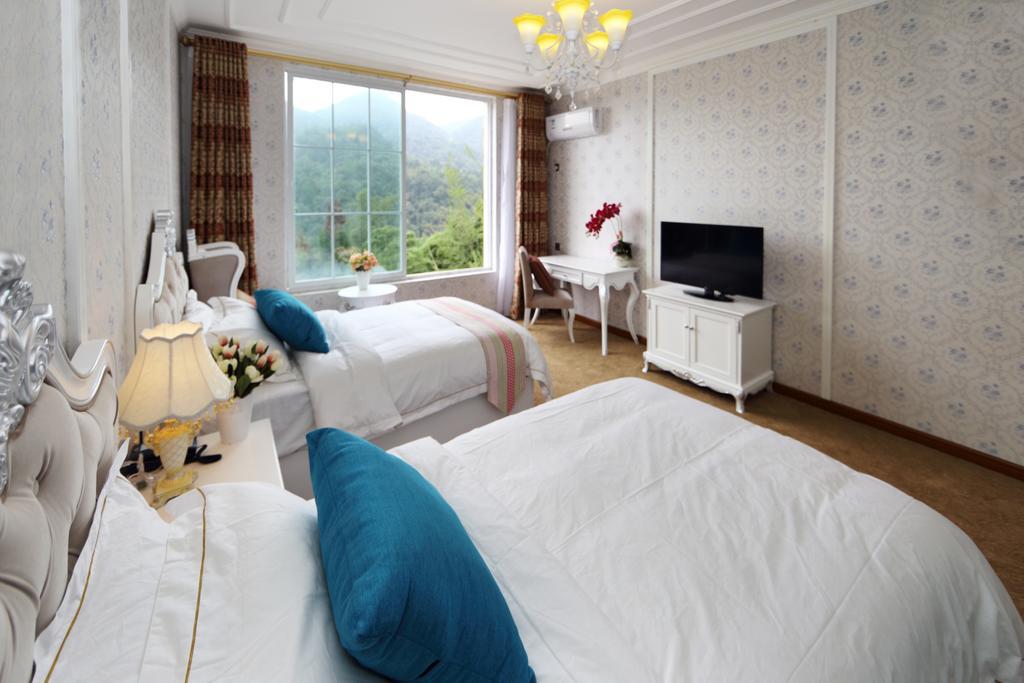 Panshan Tingquan Tuwo Holiday Resort Leshan Room photo
